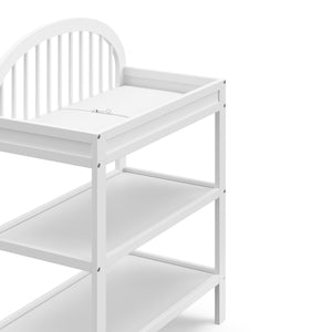 close view of white changing table