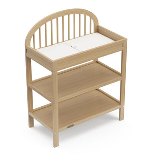 top view of driftwood changing table with changing pad