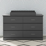 nest gray changing topper on top of brookside 6 drawer gray dresser in nursery