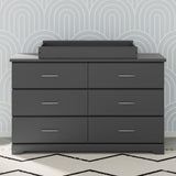 nest gray changing topper on top of brookside 6 drawer gray dresser in nursery