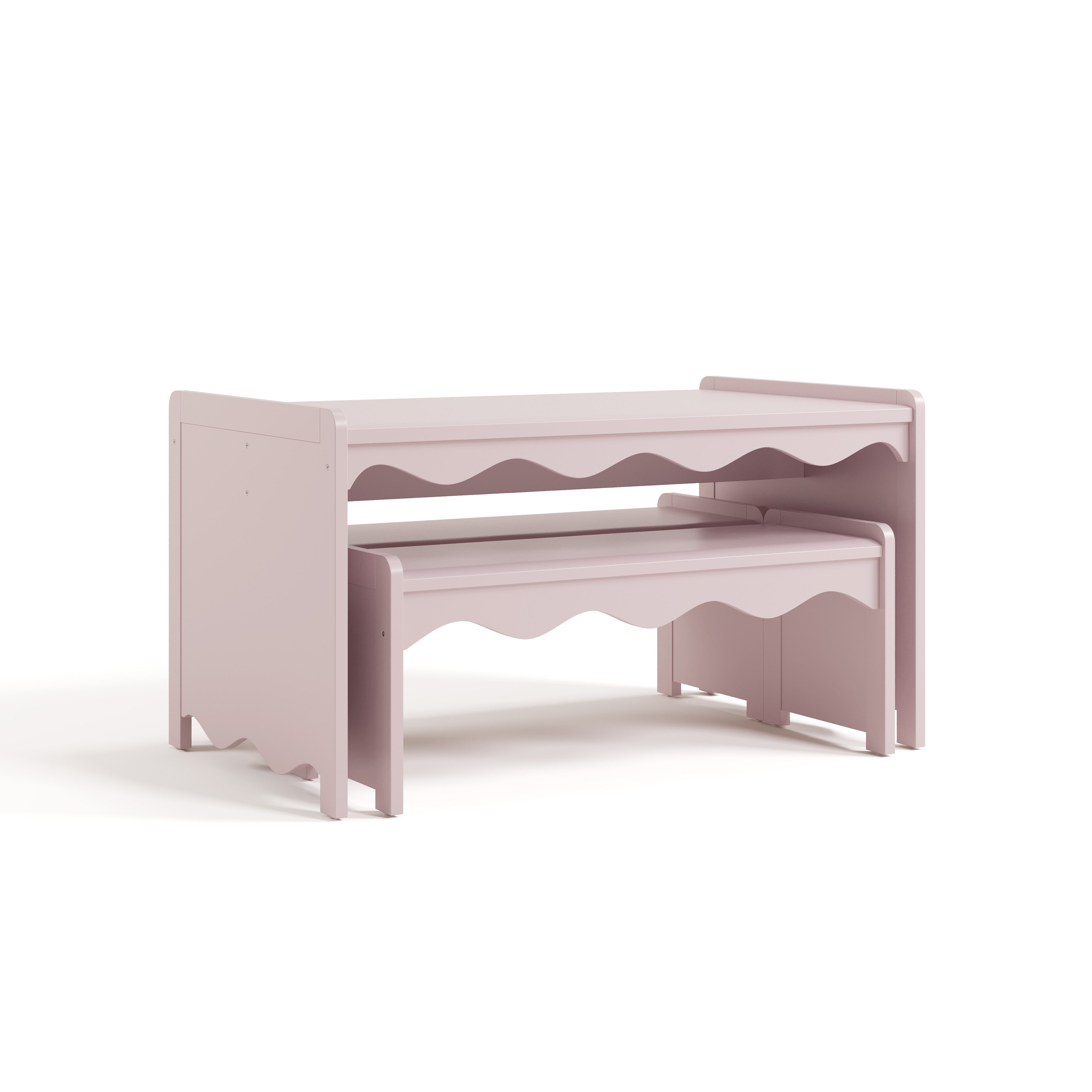 Angle view of Casablanca blush bench and table set with benches tucked under table
