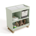 storkcraft modern convertible changing table sage with driftwood top view with changing pad and baby items inside storage cubbies