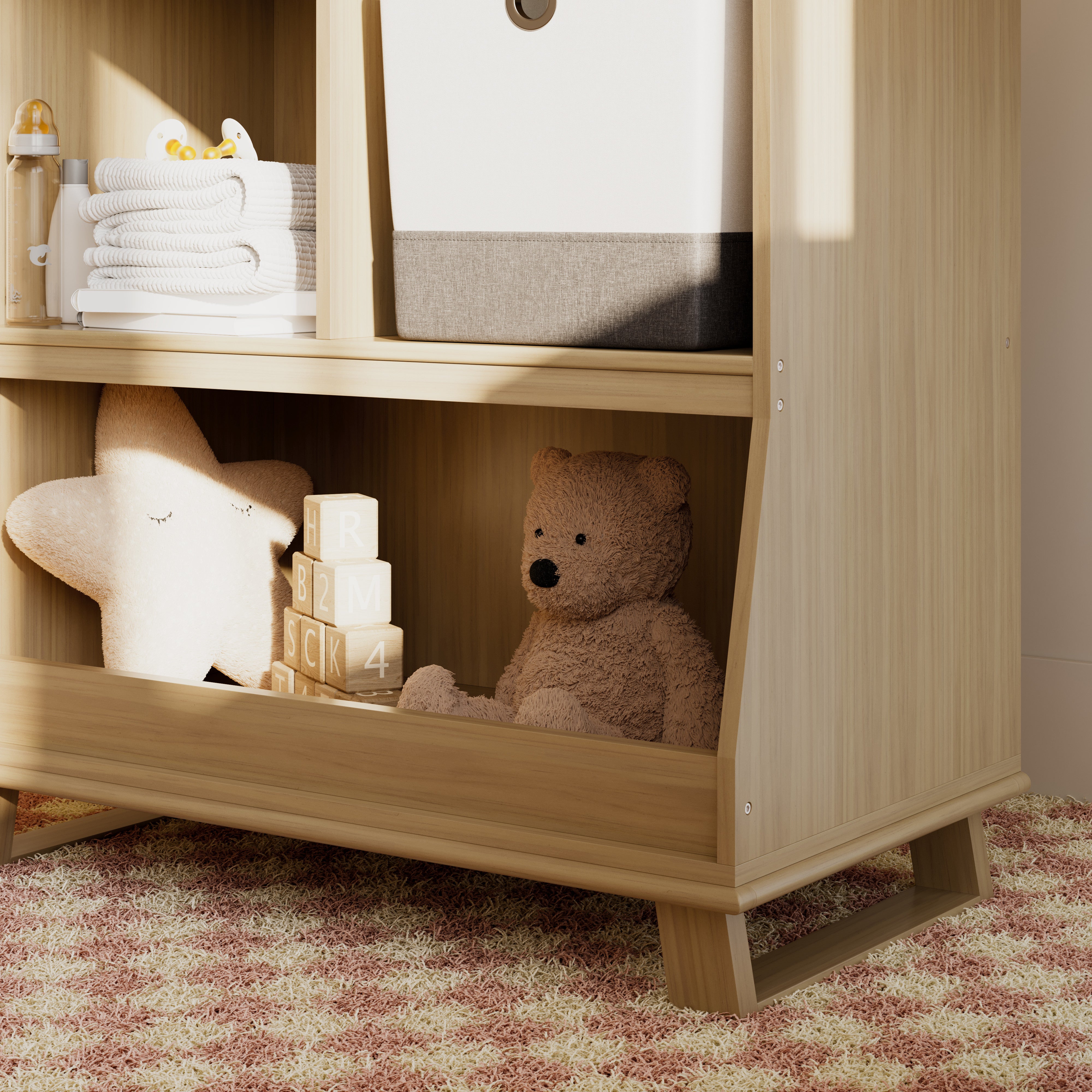 storkcraft modern convertible changing table driftwood closeup of storage and base in nursery with baby items inside