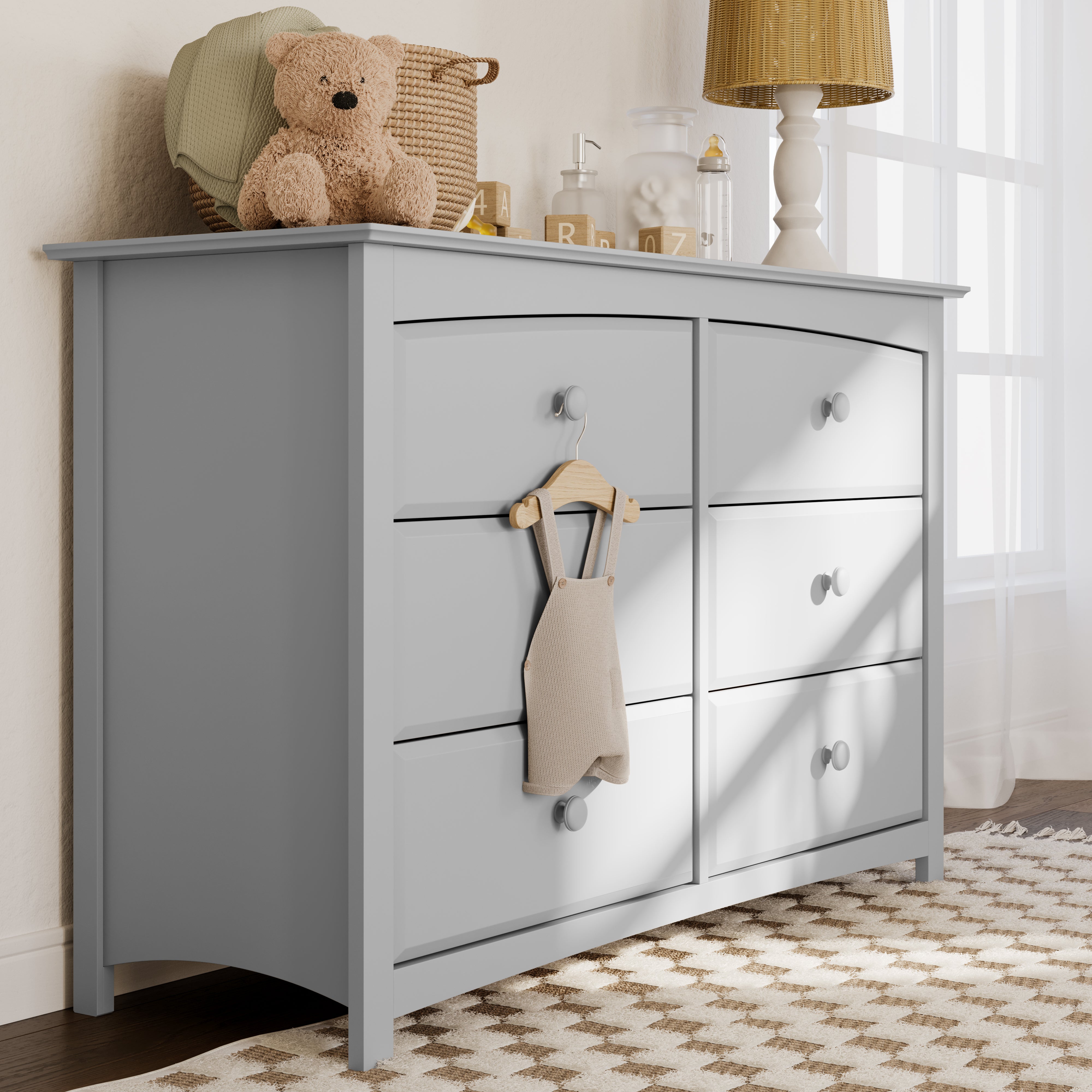 angled pebble gray 6 drawer dresser in nursery