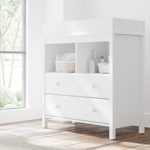 White 2 drawer chest with changing topper in nursery