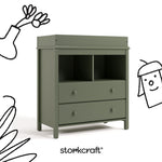 alpine olive  2 drawer changing chest with black cartoon drawings overlaid on image