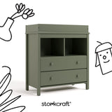 alpine olive  2 drawer changing chest with black cartoon drawings overlaid on image