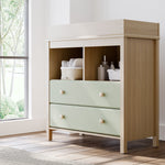 alpine 2 drawer changing chest driftwood with sage nursery room shot with changing essentials in exterior shelves