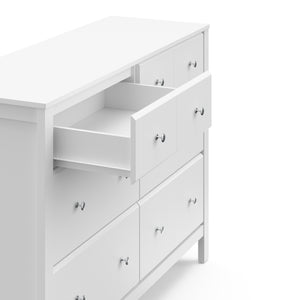 top view of white 6 drawer dresser with one open drawer