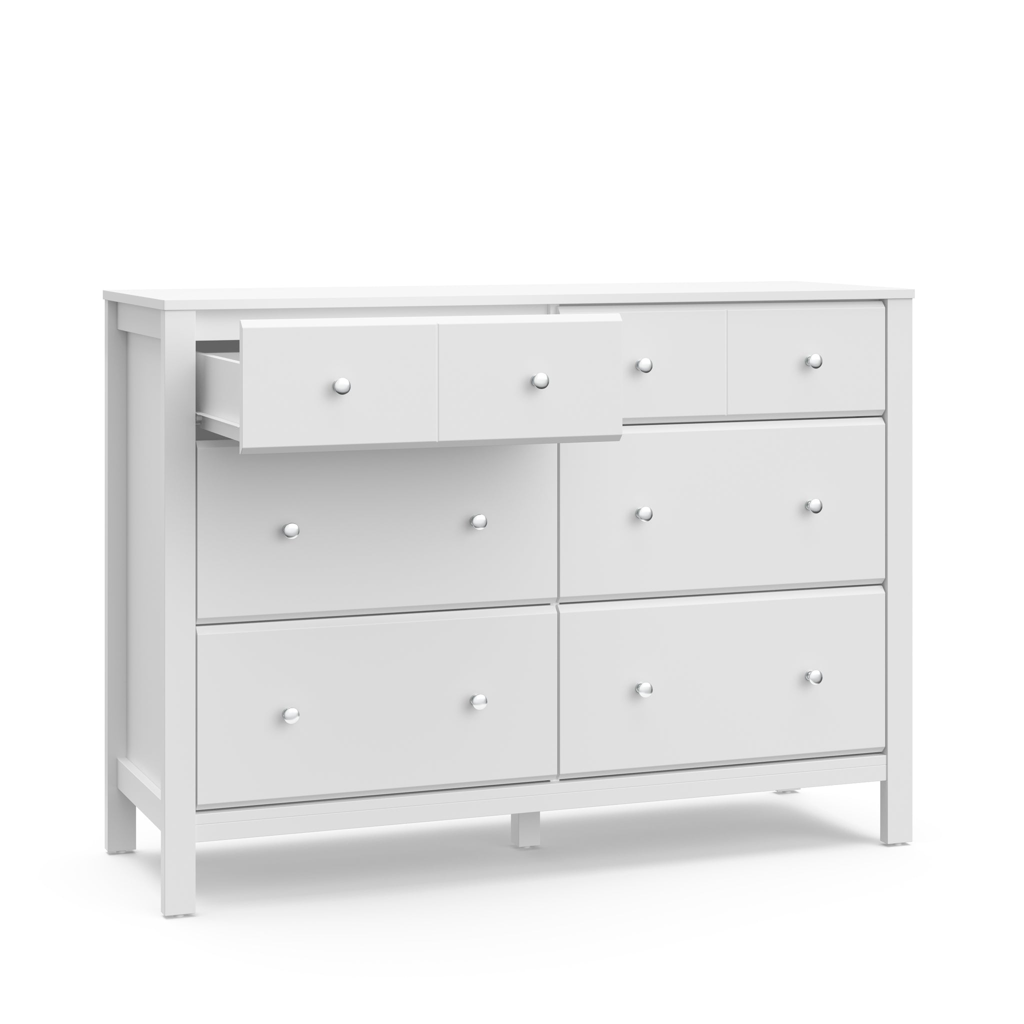 angled view of white 6 drawer dresser with one open drawer