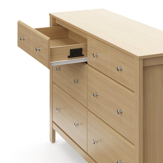 top view of driftwood 6 drawer dresser with one open drawer showing the interlocking drawer system