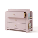 Angle view of Read-with-Me 3 drawer chest with bookshelves and changing topper in blush with driftwood with top drawer open
