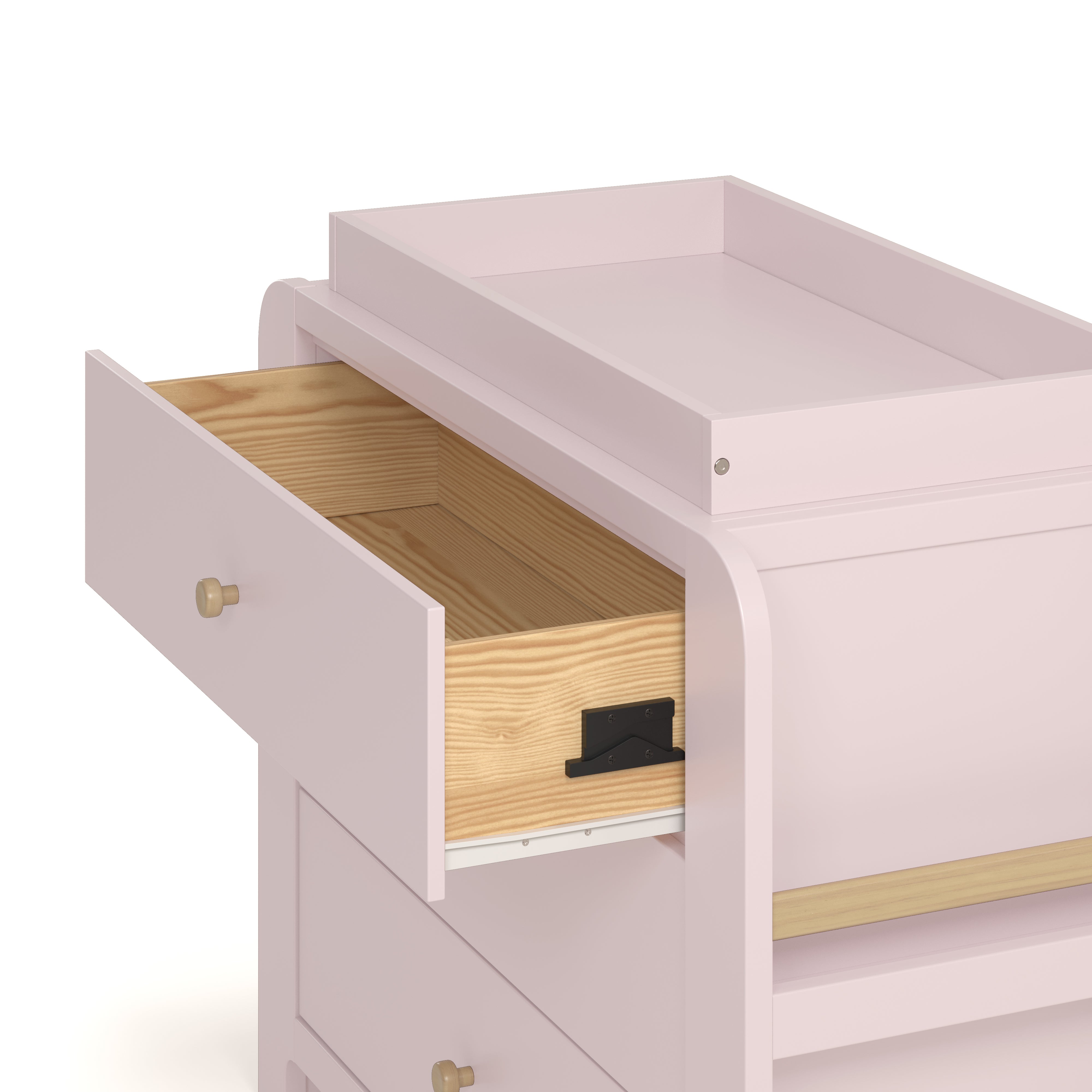 Close up drawer view of Read-with-Me 3 drawer chest with bookshelves and changing topper in blush with driftwood with top drawer open showing interlocking drawer mechanism