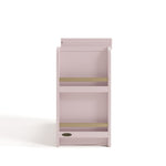 Side view of Read-with-Me 3 drawer chest with bookshelves and changing topper in blush with driftwood