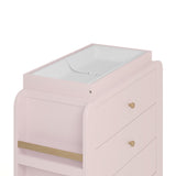 Close up view of Read-with-Me 3 drawer chest's changing topper in blush with driftwood with changing pad