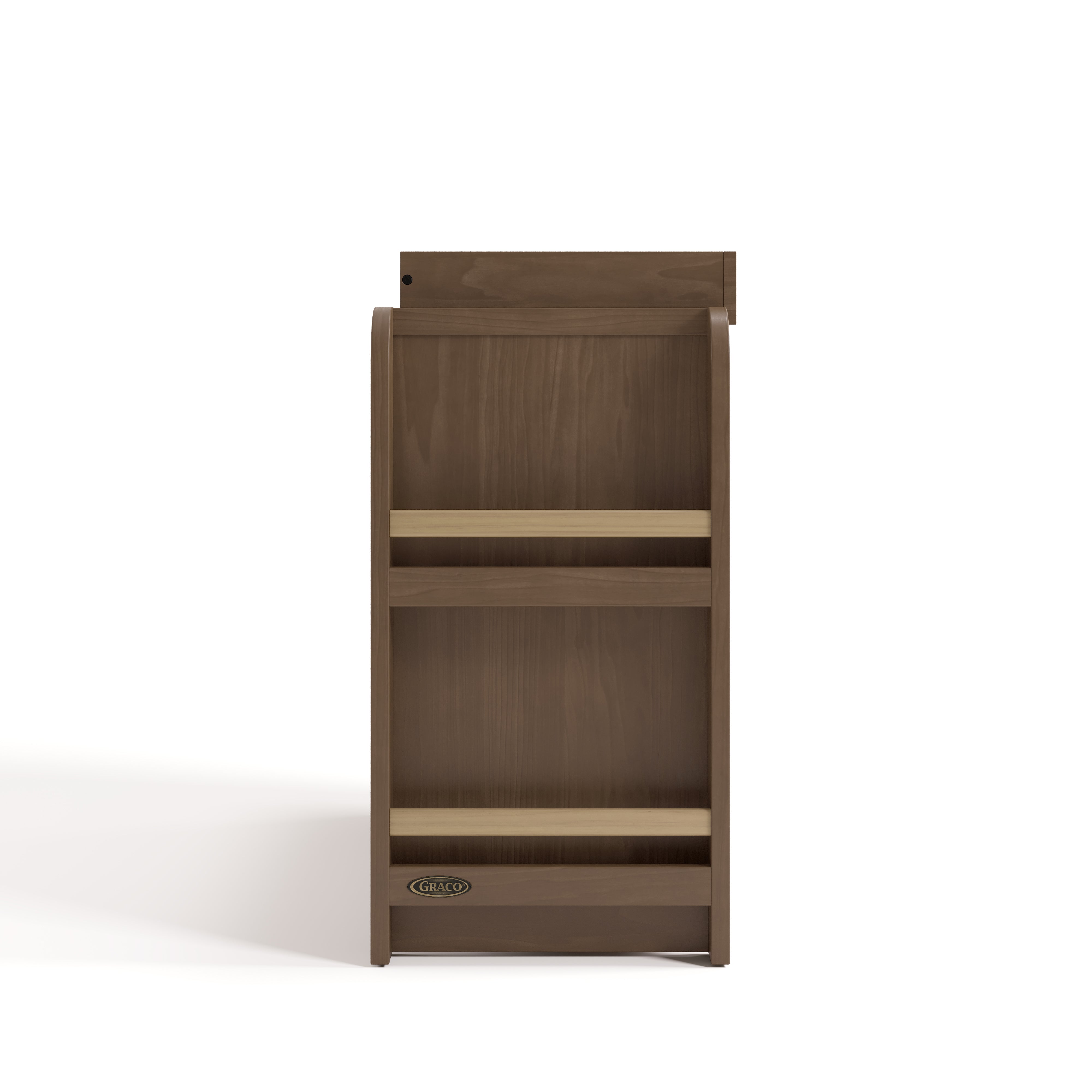 Side view of Read-with-Me 3 drawer chest with bookshelves and changing topper in hazelnut with driftwood