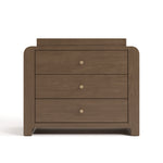 Front view of Read-with-Me 3 drawer chest with bookshelves and changing topper in hazelnut with driftwood