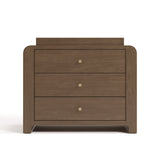 Front view of Read-with-Me 3 drawer chest with bookshelves and changing topper in hazelnut with driftwood