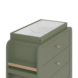 Close up view of Read-with-Me 3 drawer chest's changing topper in olive with driftwood with changing pad