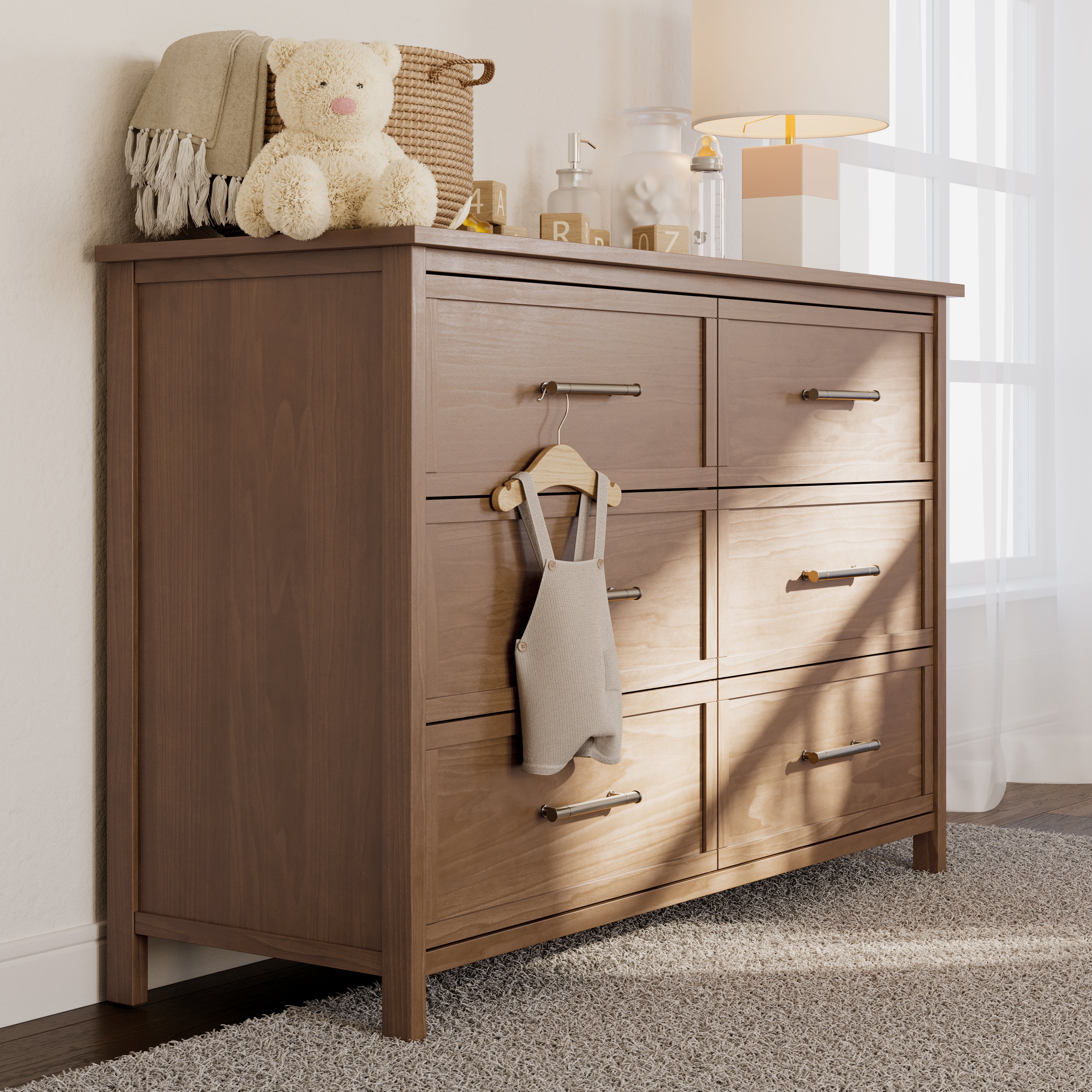 classic hazelnut 6 drawer dresser in nursery