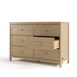 Olivia driftwood 6 drawer dresser angle view with middle right drawer open