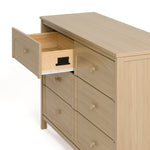 Olivia driftwood 6 drawer dresser side view of top left drawer open showing interlocking drawer mechanism