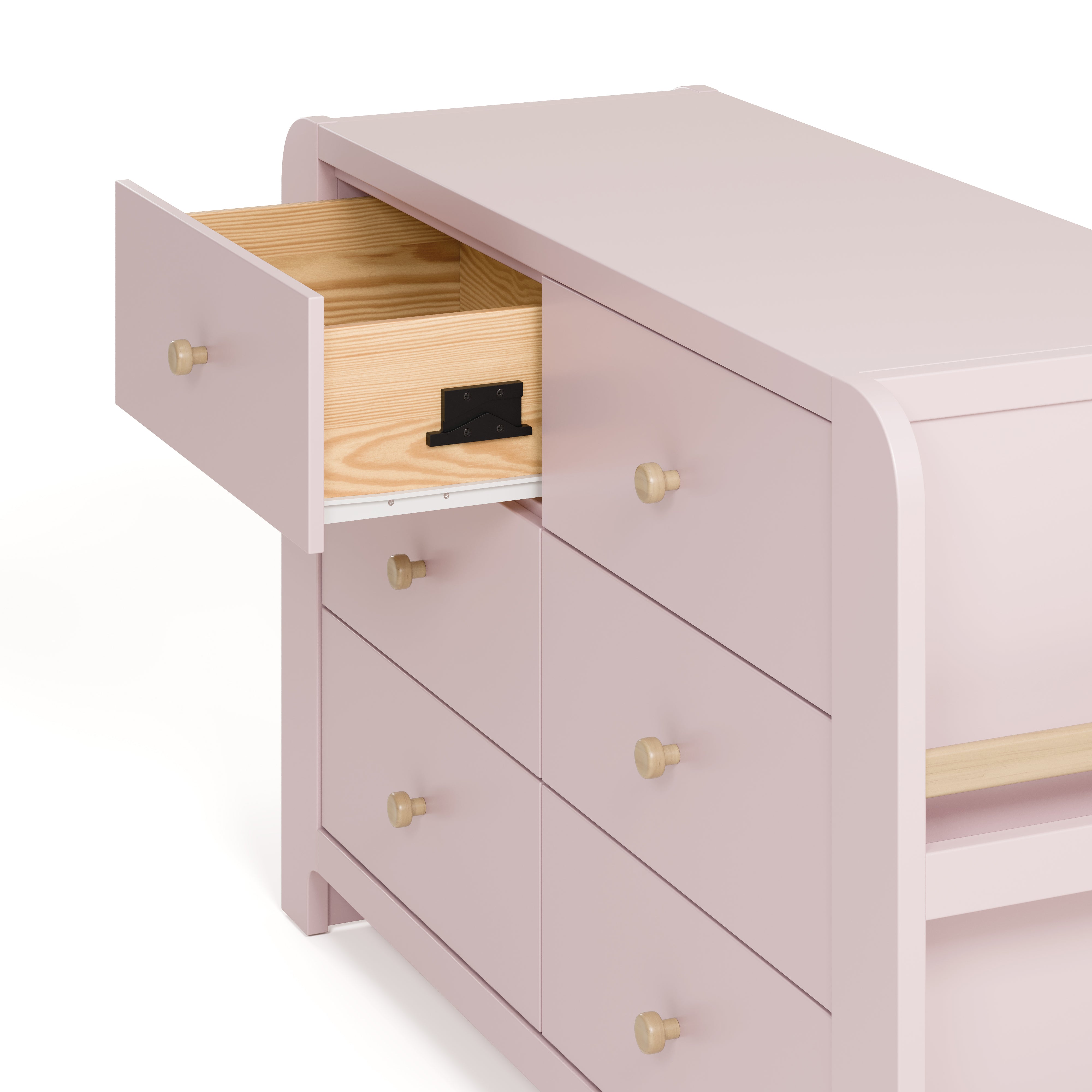 Angle view of Read-with-Me 6 drawer dresser in blush with driftwood with top left drawer open showing interlocking drawer mechanism