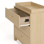 California driftwood 3 drawer chest with changing topper side view of top drawer open showing interlocking drawer mechanism
