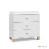California white with driftwood 3 drawer chest with changing topper with 2024 Storkcraft copyright on bottom right
