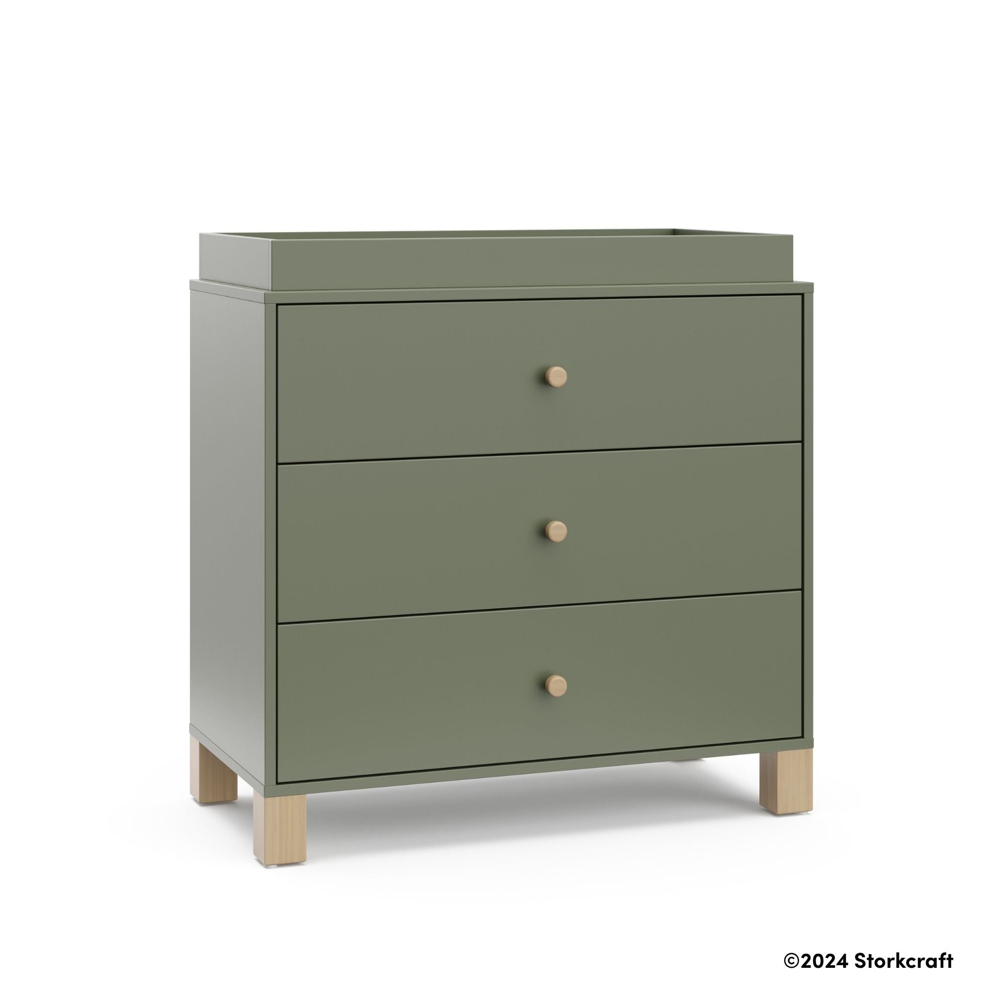 California olive with driftwood 3 drawer chest with changing topper with 2024 Storkcraft copyright on bottom right