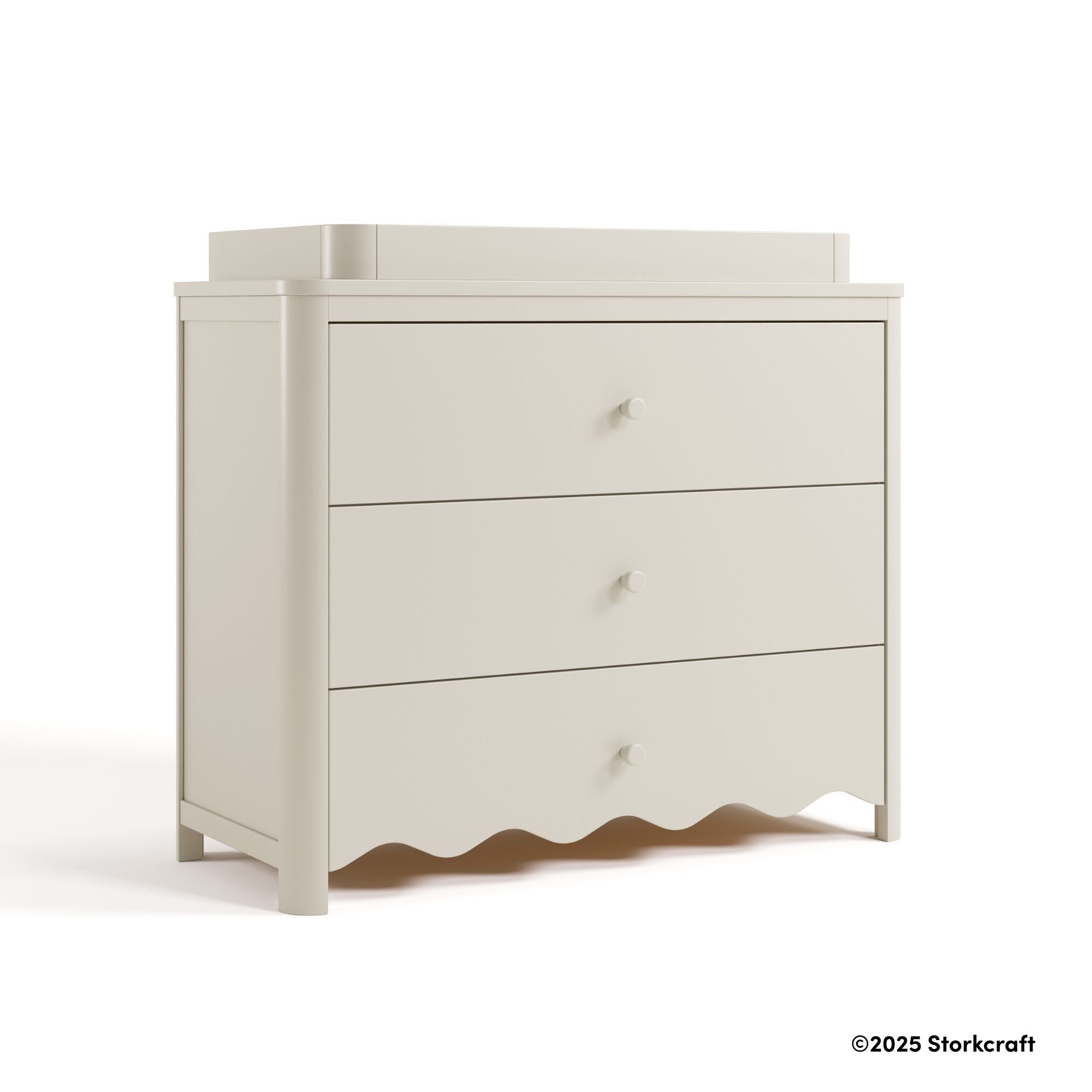 Casablanca frosted oat 3 drawer chest with changing topper with 2025 Storkcraft copyright on bottom right