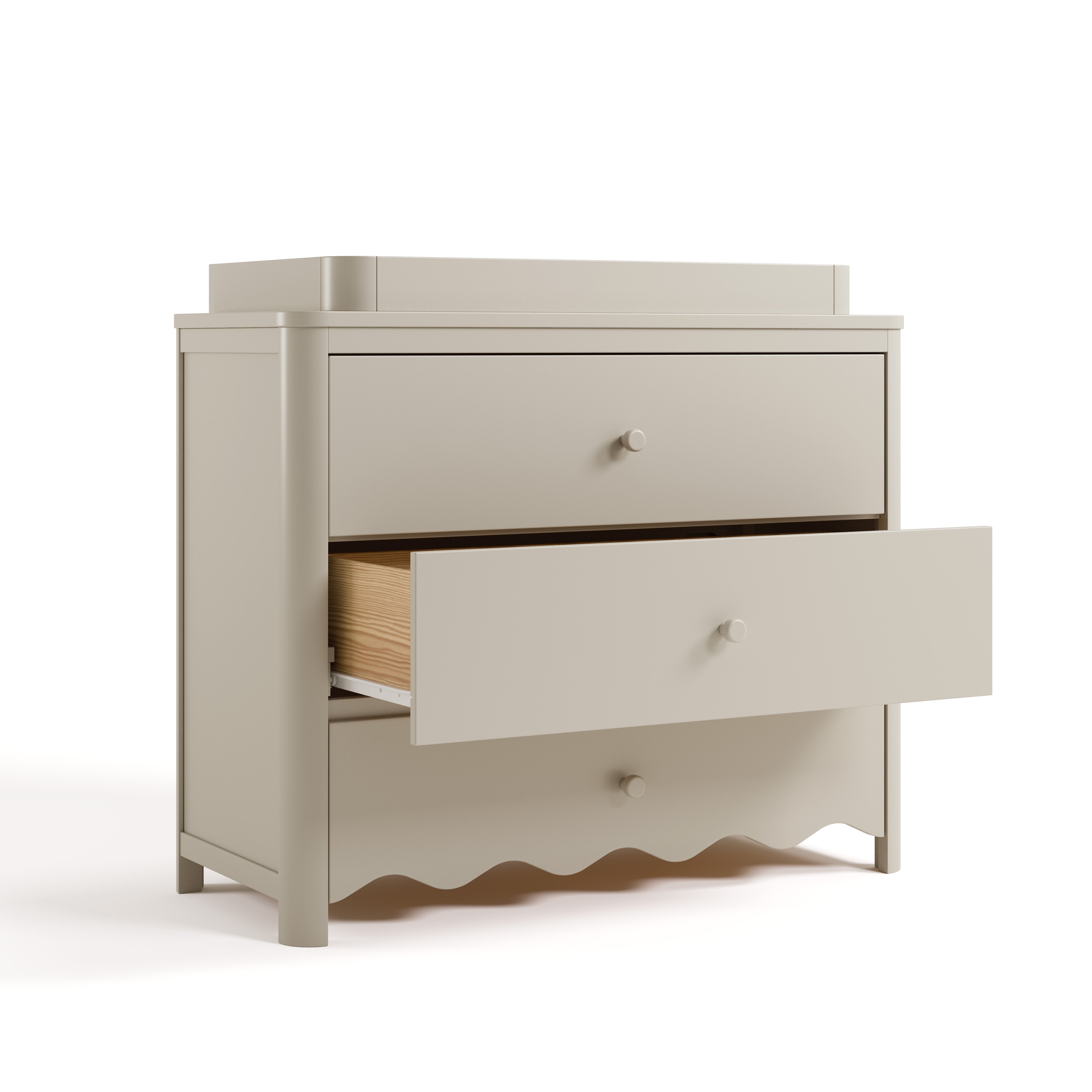 Casablanca frosted oat 3 drawer chest with topper and middle drawer open angle view