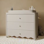 Casablanca frosted oat 3 drawer chest with topper nursery shot with changing essentials