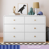 santos 6 drawer white with driftwood dresser in nursery with storkcraftnext written on bottom