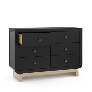Angled view of black 6 drawer dresser with driftwood base with 1 open drawer