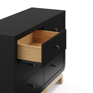 Top view of black 6 drawer dresser with driftwood base with 1 open drawer