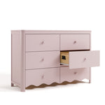 Storkcraft Casablanca blush 6 drawer dresser angle view with middle right drawer open showing interlocking drawer mechanism