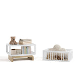 Santorini white with driftwood bassinet converted to bookcase and toybox with baby items inside