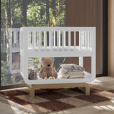 Santorini white with driftwood bassinet in nursery