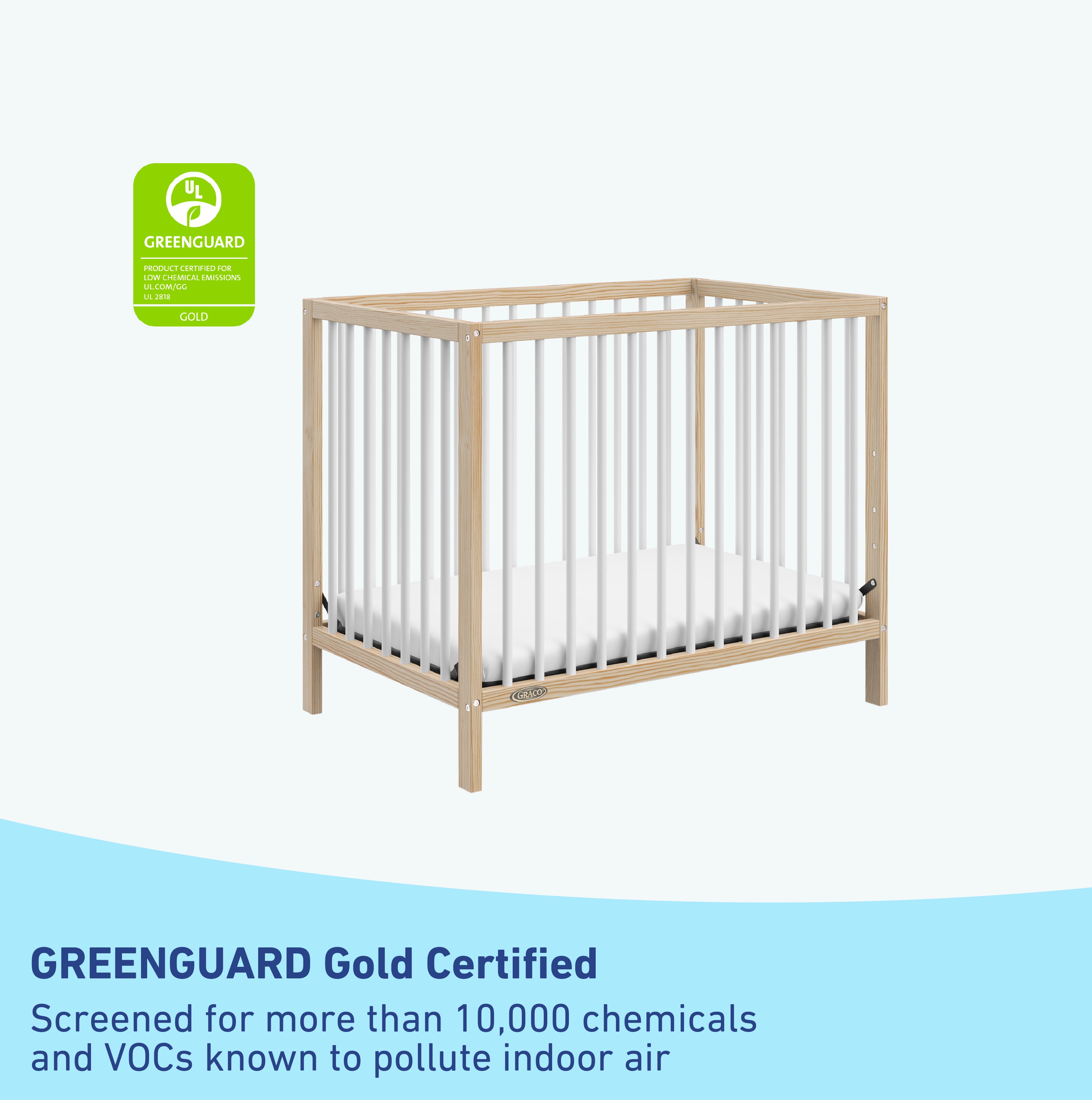 graco teddi natural with white mini crib GREENGUARD Gold Certified callout