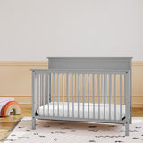 storkcraft horizon pebble gray crib in nursery
