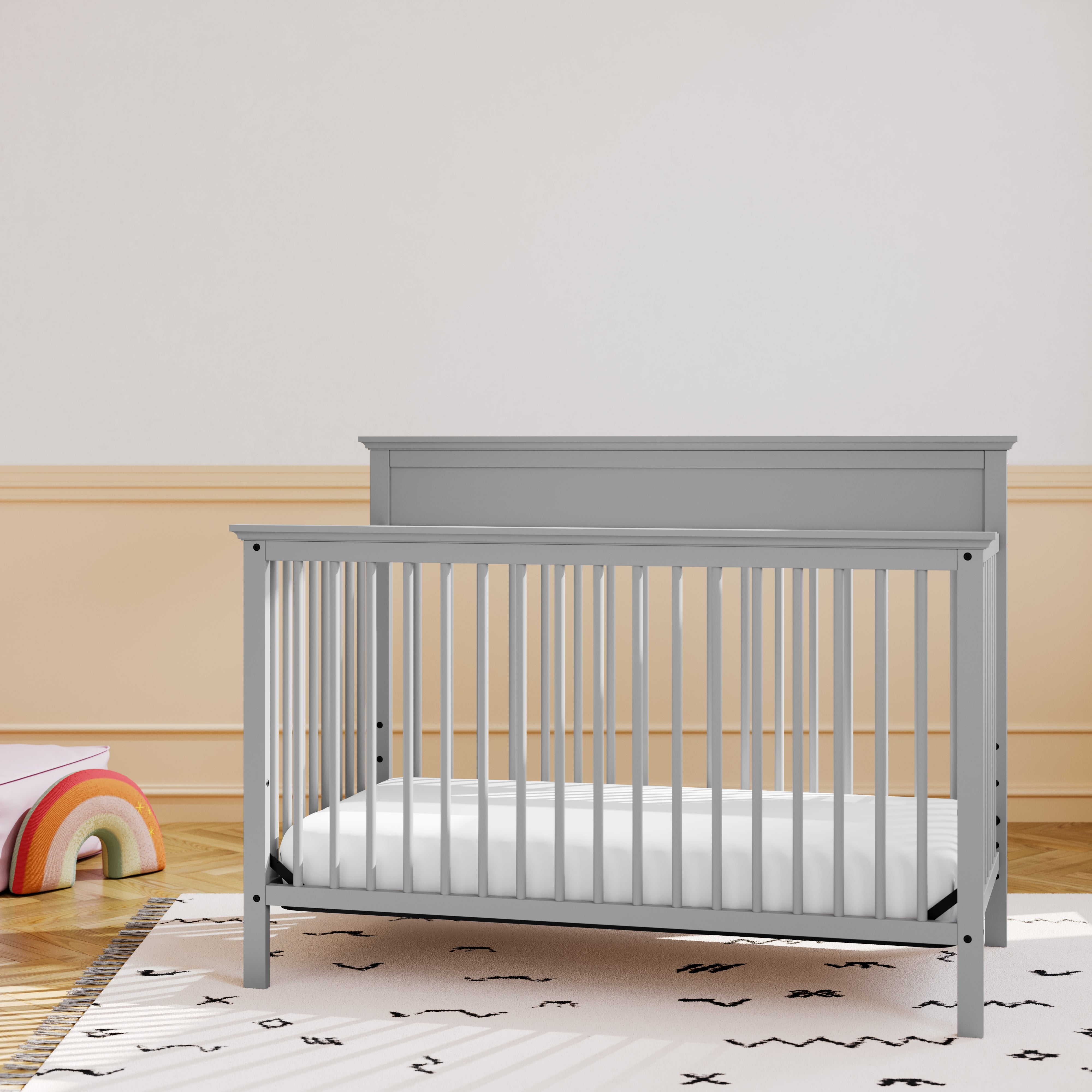 storkcraft horizon pebble gray crib in nursery