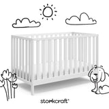 Side view of a crib with decorative doodle drawings overlaid on the image.