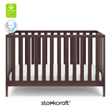 Espresso crib with overlay text highlighting certification seals