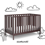 Side view of a crib with decorative doodle drawings overlaid on the image.