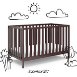 Side view of a crib with decorative doodle drawings overlaid on the image.