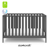 Gray crib with overlay text highlighting certification seals