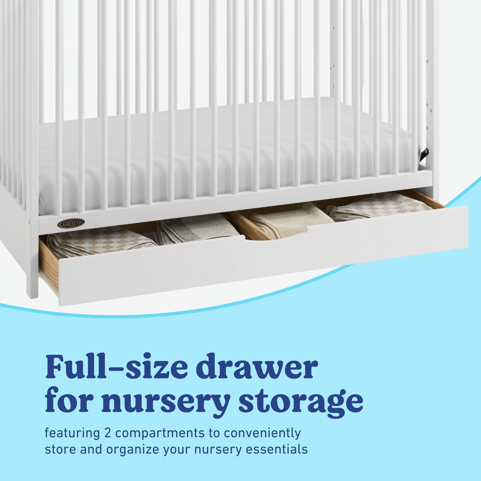 Olivia white crib full-size storage drawer callout