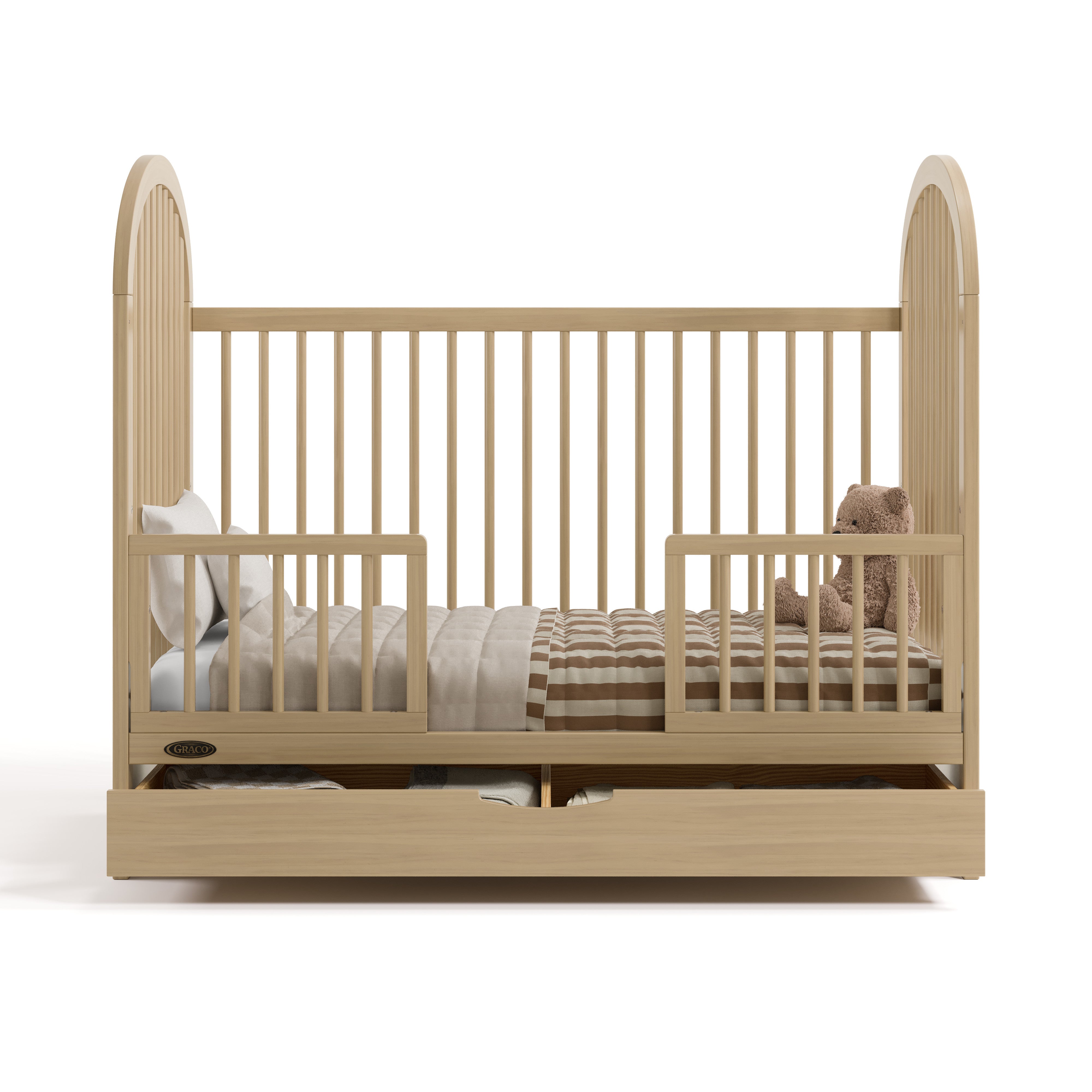 Olivia driftwood crib with drawer converted to toddler bed