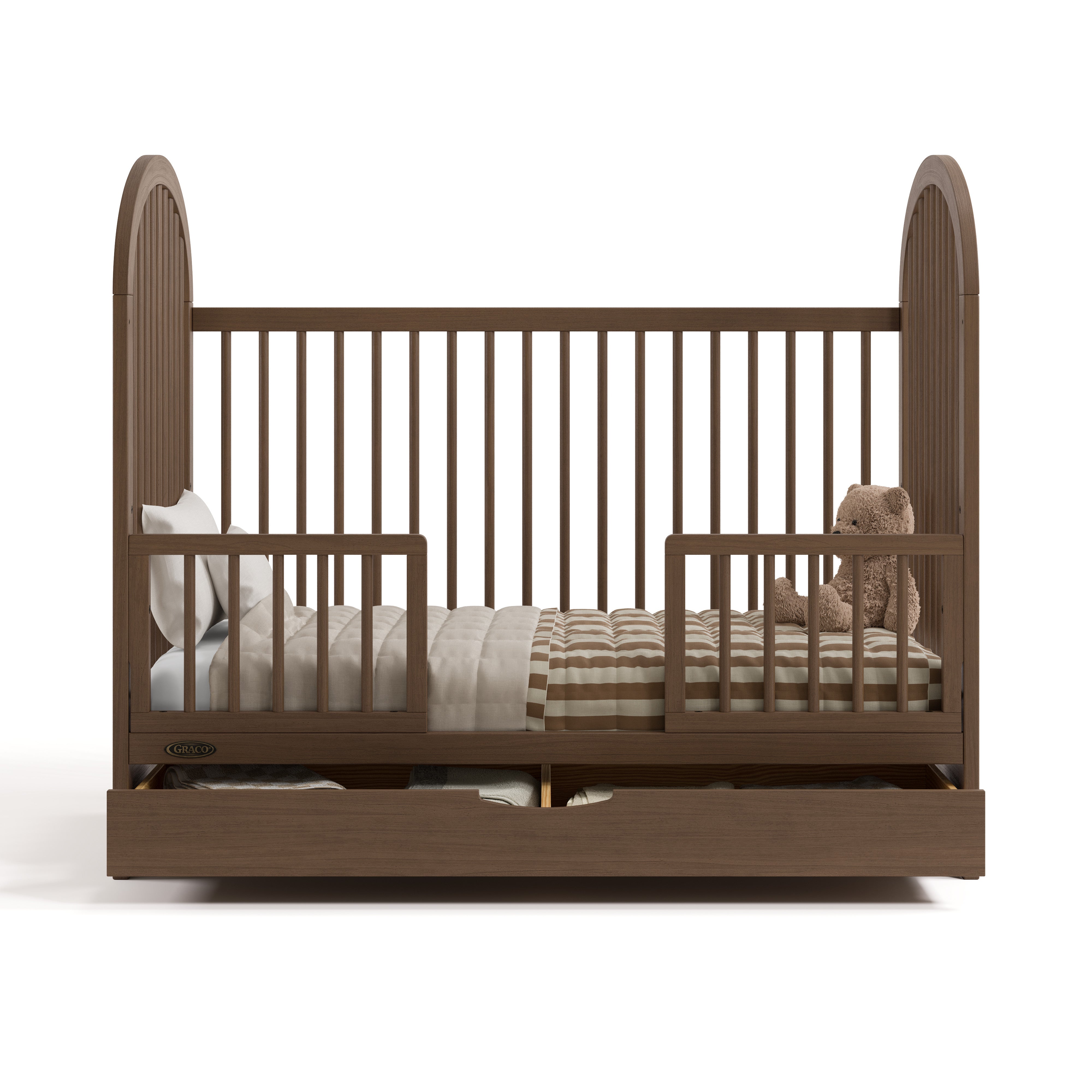 Olivia hazelnut crib with drawer converted to toddler bed